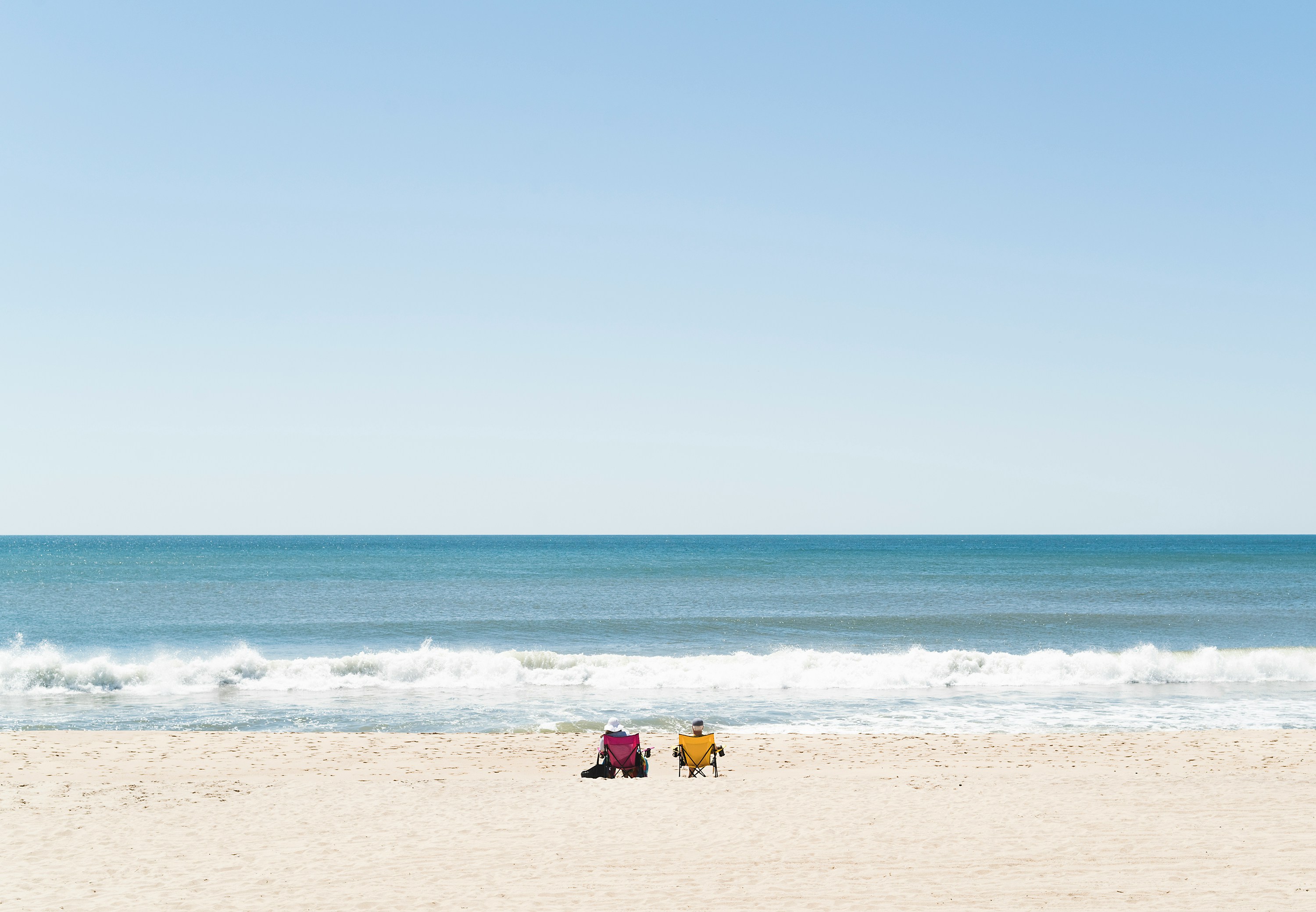 people in beach chairs